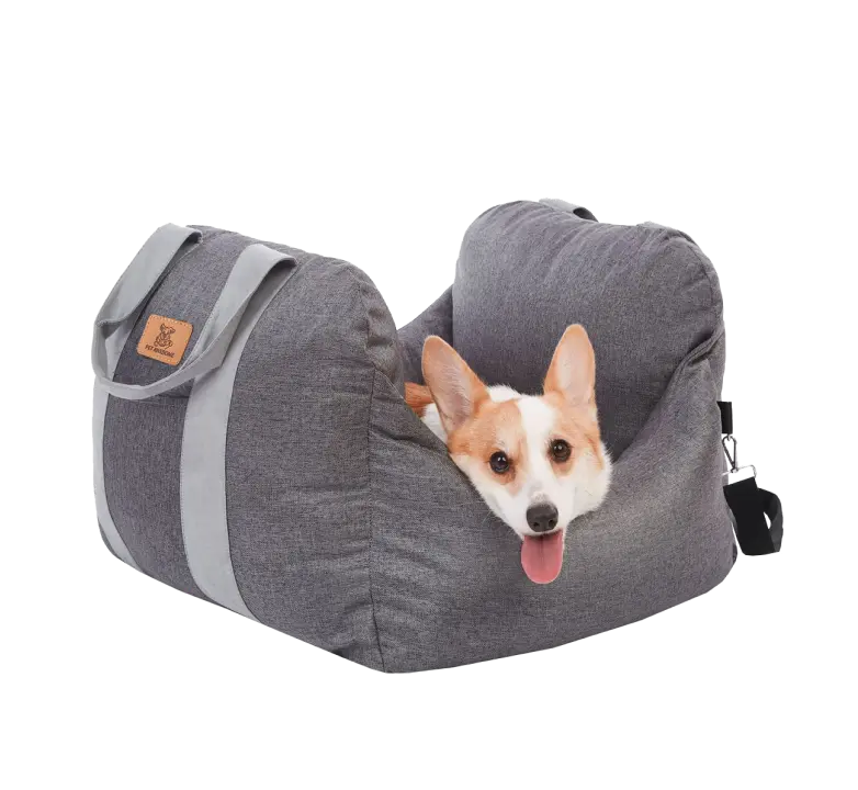 Corgi smiling in Pet Awesome grey dog car seat showing side handles and safety straps